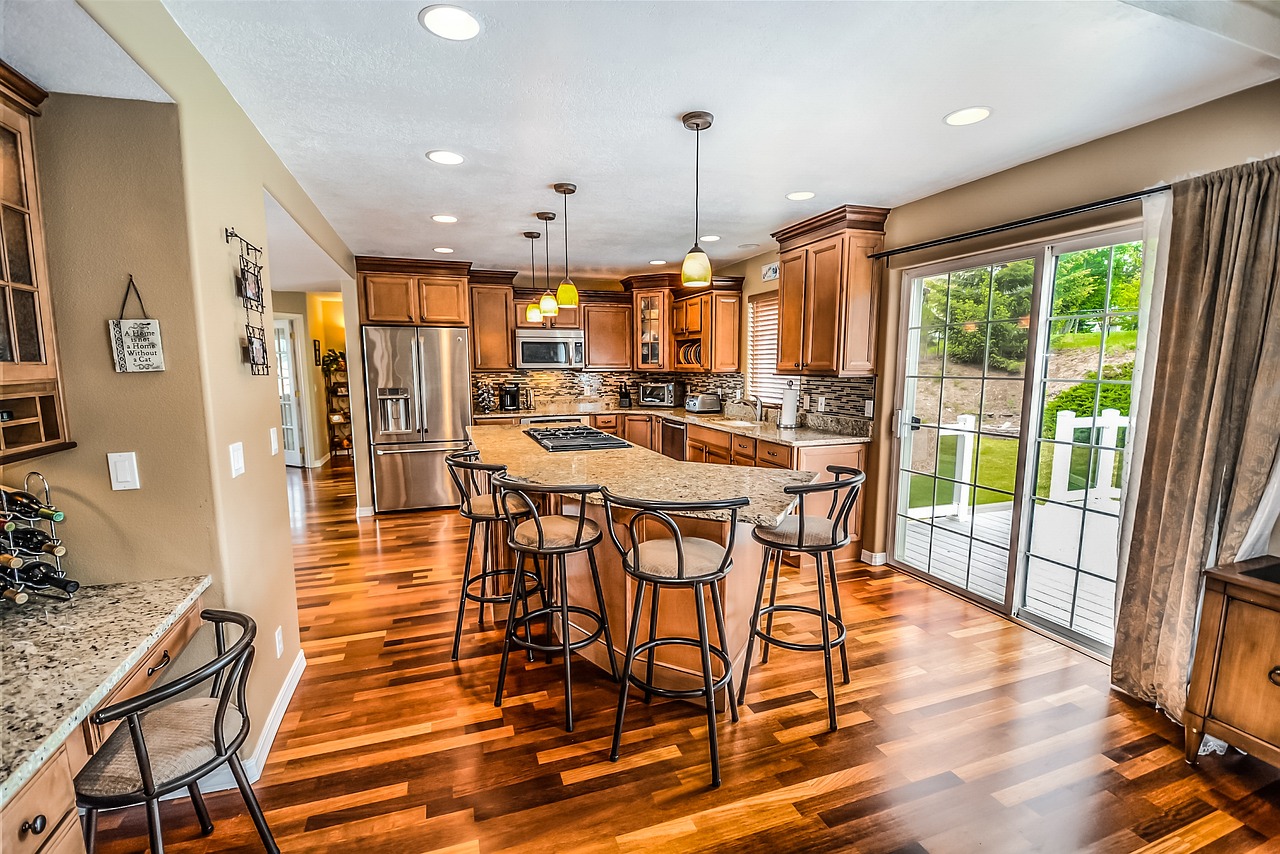 A kitchen island with a thick stone edge detail