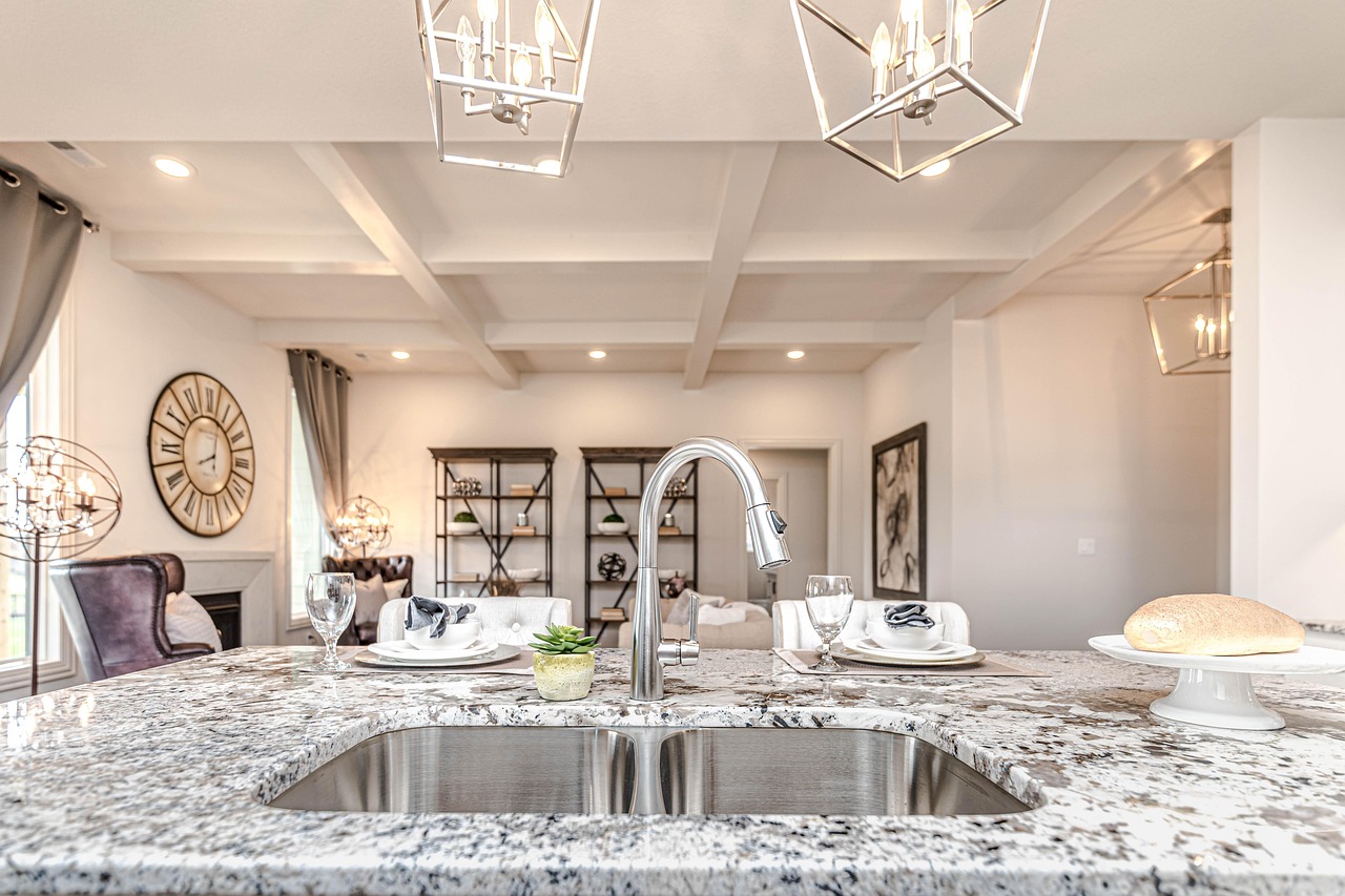 A kitchen island with a seating overhang